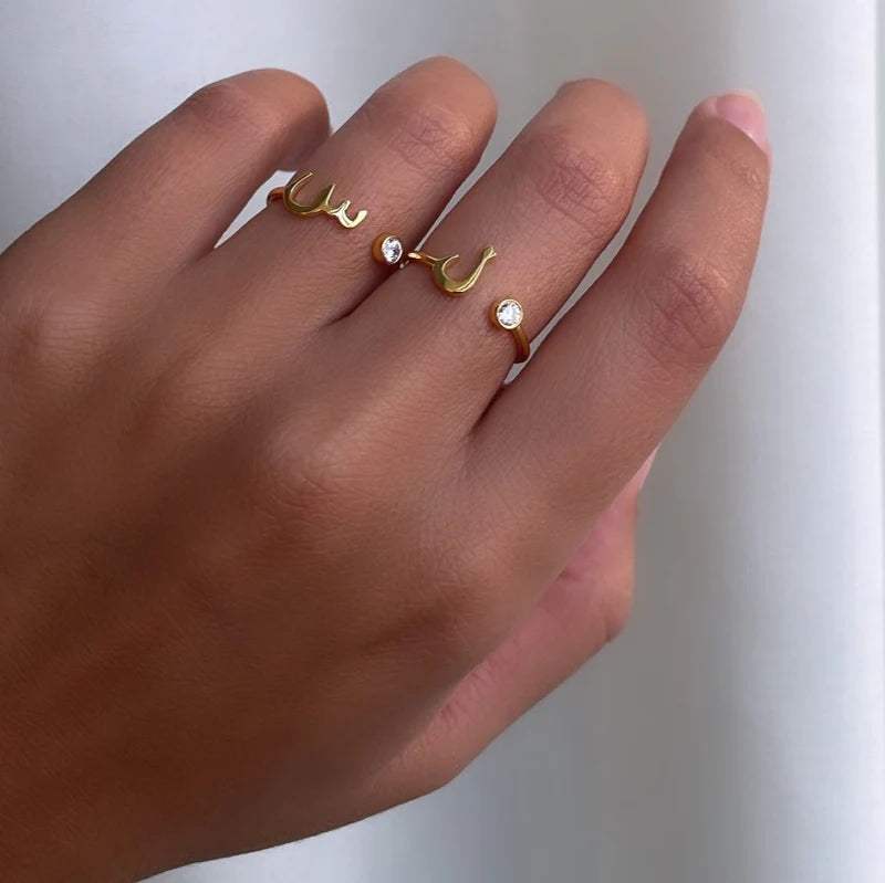 Arabic initial dot ring