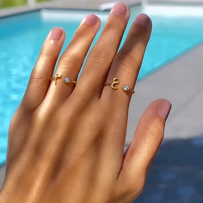 Arabic initial dot ring